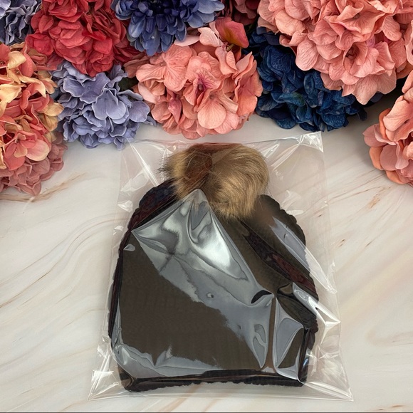 Black Knit Criss Cross Ponytail Pom Pom Beanie - Picture 13 of 15